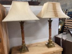 A pair of 'David Hunt' wood and gilt metal table lamps, height 63cm