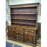 A late 18th century oak dresser, length 166cm, depth 45cm, height 205cm