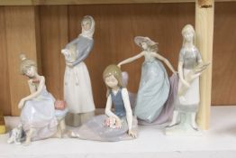 Four Lladro figurines and one Lladro style figurine, height 27cm