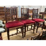 A harlequin set of eleven 19th century ash spindle back rush seat chairs(two having arms)