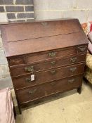 A George III oak bureau, width 94cm, depth 49cm, height 105cm