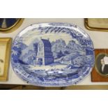 An Orientalist blue and white meat platter, c.1820-40, 52cm