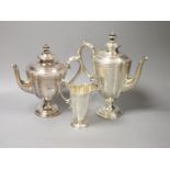 A Victorian engraved silver three-piece tea and coffee service, Frederick Elkington, Birmingham,