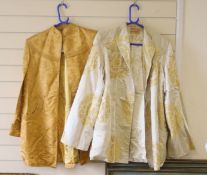 A 1940's Chinese yellow damask jacket, length 87cm, and a similar brocade jacket