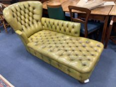 A Victorian style daybed upholstered in buttoned green leather, length 170cm, width 70cm, height