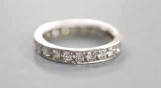A white metal and diamond set full eternity ring,size N, gross 4.2 grams, set with twenty three