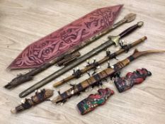 A group of Dayak Borneo tribal weapons and a Chinese sword