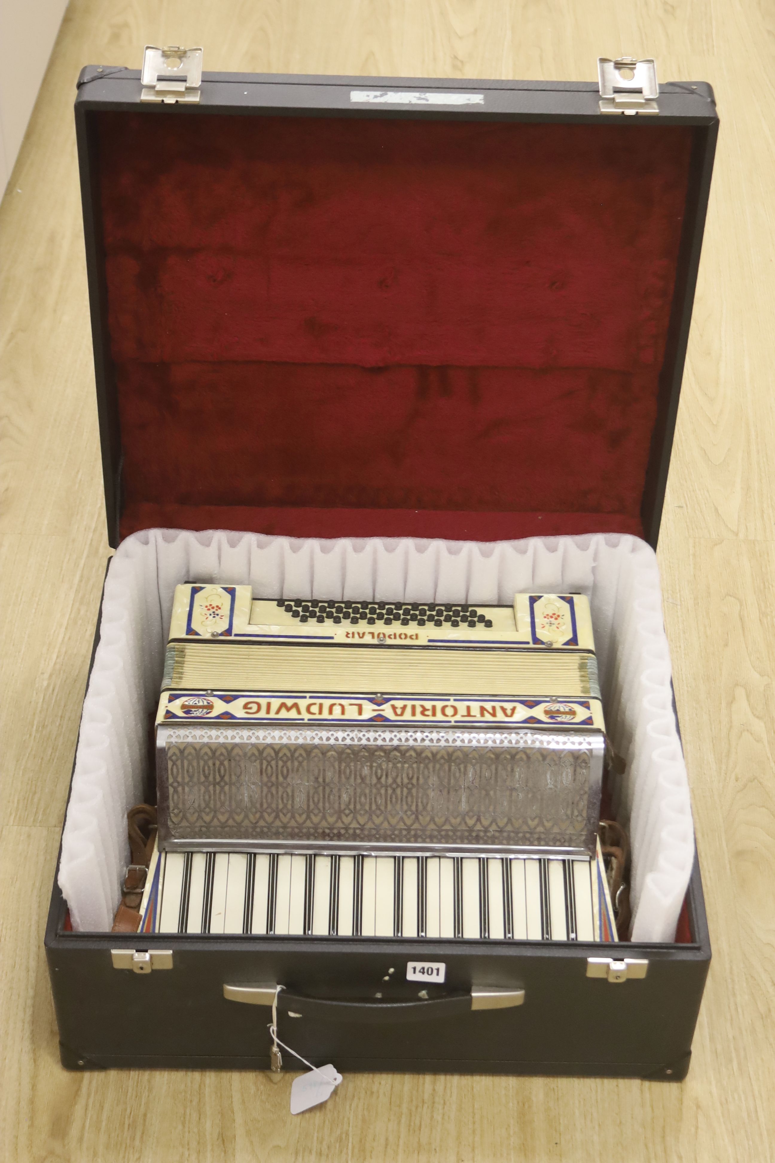 A cased Antoria Ludwig accordian, cased
