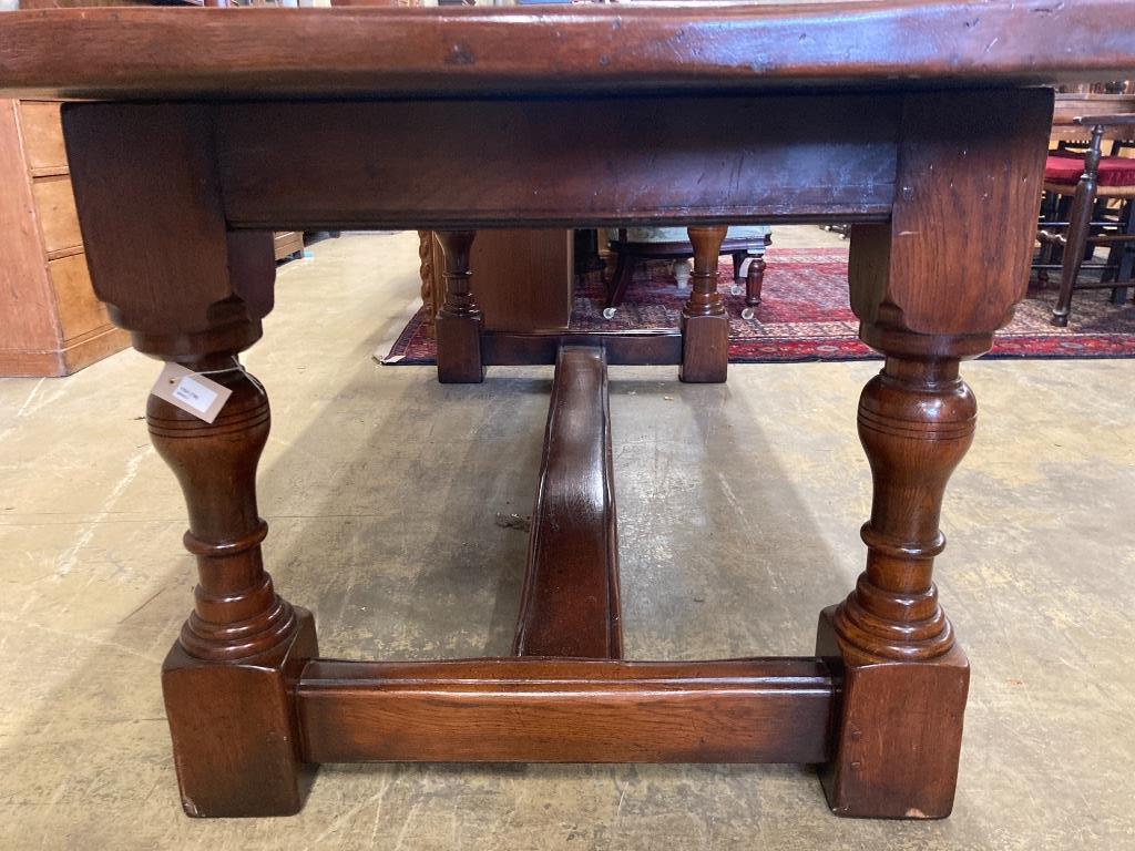 An 18th century style oak refectory dining table, length 228cm, depth 91cm, height 76cm - Image 3 of 3