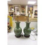 A pair of Chinese celadon crackle glazed table lamps, height 46cm excluding light fitting