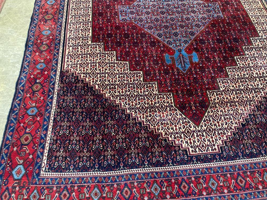 A Feraghan pattern red ground carpet, 320 x 250cm - Image 2 of 3