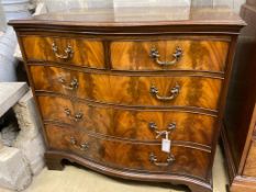 A George III style mahogany serpentine chestfitted two short drawers and three graduated long