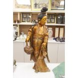 A large Chinese giltwood figure of a lady, height 59cm