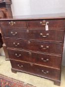 A George III oak chestfitted two short drawers and four graduated long drawers, width 115cm, depth