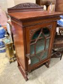 A mahogany cabinet stamped 'Admiral's day cabin 425', width 63cm, depth 42cm, height 115cm