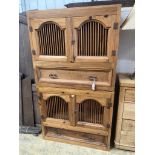 A Continental pine four door hutch cabinet, width 98cm, depth 46cm, height 175cm