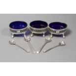 A set of three George III oval pierced silver salts, D & R Hennell, London 1771, 81mm and four