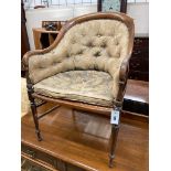 A late Victorian walnut caned seat back armchair