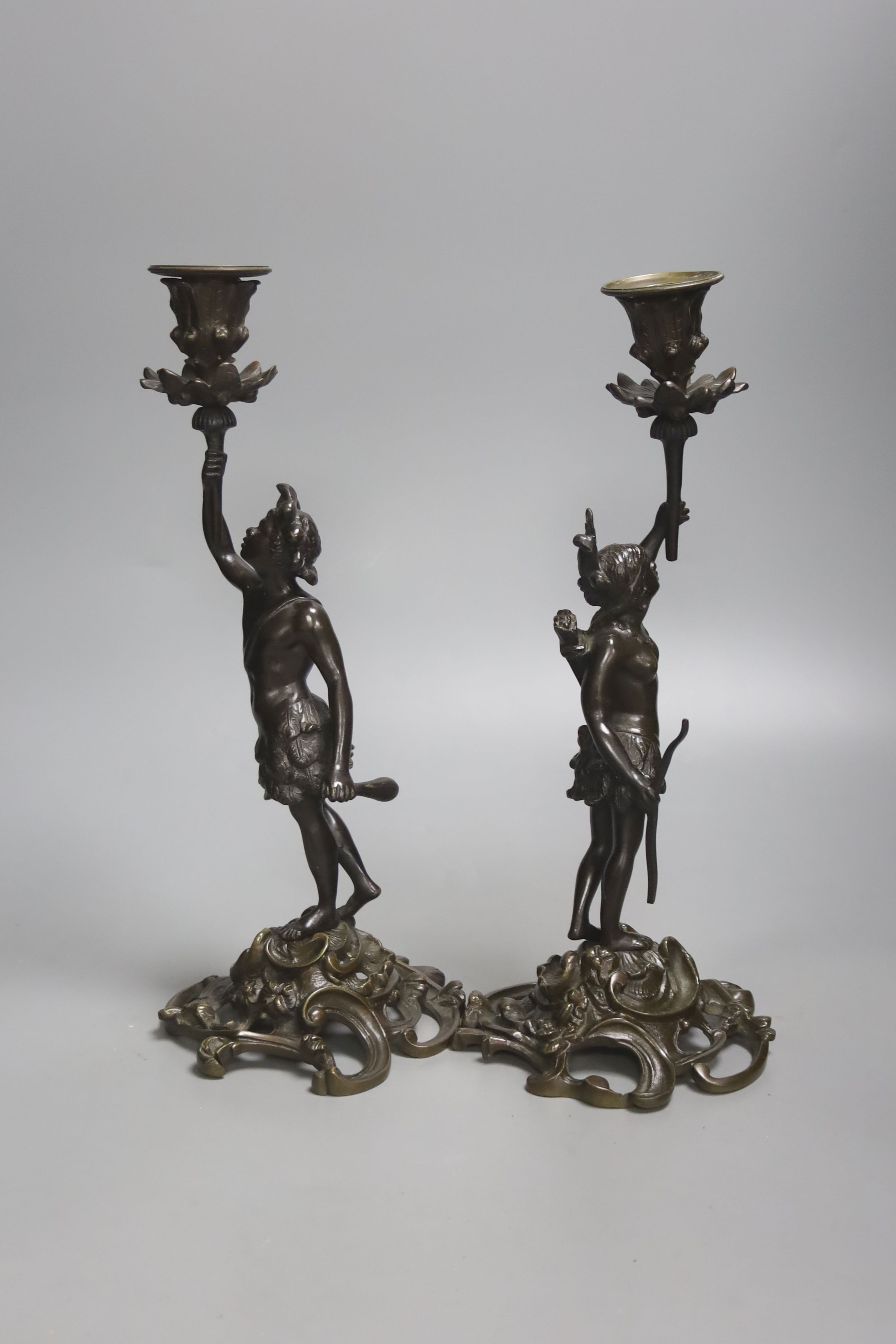 A pair of 19th century French bronze candlesticks, modelled as natives, height 32cm - Image 2 of 3