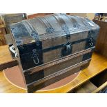 A Victorian iron mounted domed top trunk with street iron mounts, length 81cm, depth 49cm, height