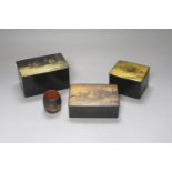 Three Russian lacquer ‘troika’ boxes, largest 13.5cm and a napkin ring