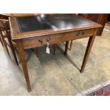 A 1920's oak writing table, width 91cm, depth 60cm, height 76cm