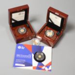 Two QEII gold half sovereigns, a quarter gold sovereign, a 1/40th oz gold proof coin