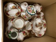 A Wemyss Apple blossom preserve jar and cover, a similar cabbage roses vase and a quantity of Royal