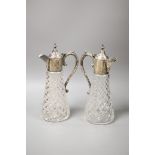 A pair of modern silver mounted cut glass claret jugs, Birmingham, 1972/74, height 32.3cm.