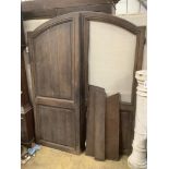 A pair of 18th century French oak armoire doors, width 150cm
