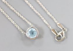 A modern Theo Fennell 18ct white gold and solitaire blue topaz set pendant necklace,overall 42cm,