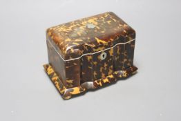 A 19th century tortoiseshell and ivory tea caddy, width 8.5cm height 11cm