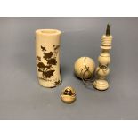 A Japanese gilt lacquered ivory vase, 11.2cm high, a 19th century ivory cup and ball game and an