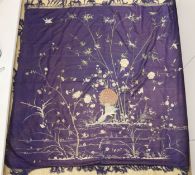 An early 20th century Chinese purple silk embroidered throw edged with trimming, 130 x 134cm