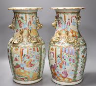 A pair of late 19th century Chinese famille rose vases, height 36cm