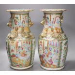 A pair of late 19th century Chinese famille rose vases, height 36cm