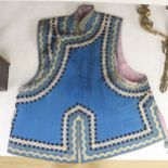 An early 20th century Chinese blue silk waistcoat