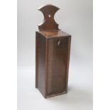 A 19th century oak candle box, height 45cm