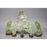 including a pale green hardstone carving of a deer amongst birds and foliage, a pair of similar