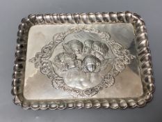 An Edwardian repousse silver dressing table tray with Reynold's Angels decoration, Birmingham,