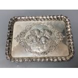 An Edwardian repousse silver dressing table tray with Reynold's Angels decoration, Birmingham,