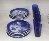 A set of six Bristol blue glass tumblers and eight Royal Copenhagen Christmas plates