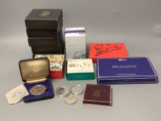 A group of Royal Mint UK proof and brilliant uncirculated coins.including a 1/10th oz. gold coin,