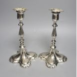 A pair of plated candlesticks, height 26cm