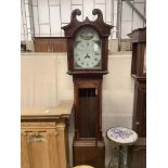 An early 19th century inlaid oak eight day longcase clock with painted dial marked William Bellman