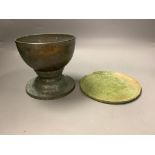 A Cambodian bronze ritual water bowl and stand and a similar mirror, Khmer, 12th/13th