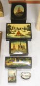 Six Russian Papier mache boxes, each decorated with churches or cathedrals, largest 17 cm