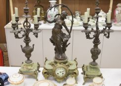 A 19th century French spelter and onyx clock garniture, height 61cm