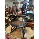 A Windsor beech rocking chair, width 59cm, depth 45cm, height 106cm