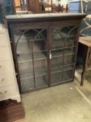 An early 19th century mahogany bookcase top, width 114cm